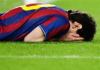 Messi down and out