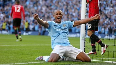 Vincent_Kompany_scoring_in_the_Manchester_Derby.jpg